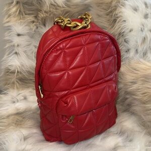 Red-hot Zara quilted backpack – stylish, functional, and bold!
